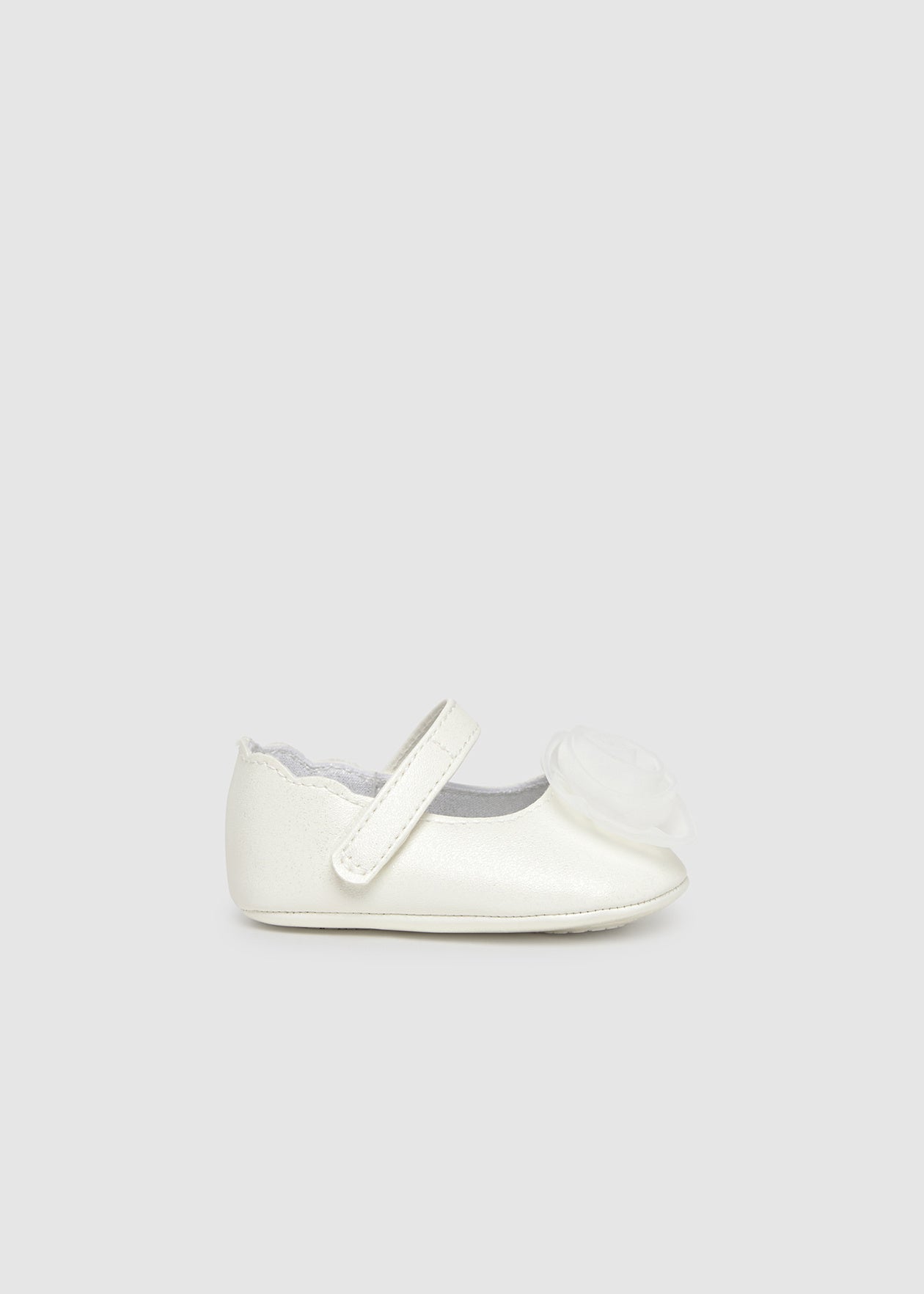 White shoe on a light gray background